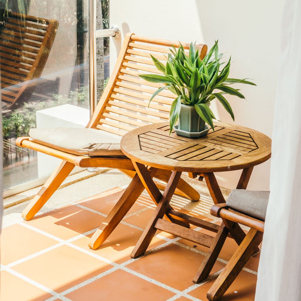 Outdoor rattan furniture set in garden setting exporters